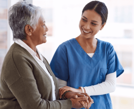 Professional nurse providing compassionate care to elderly resident